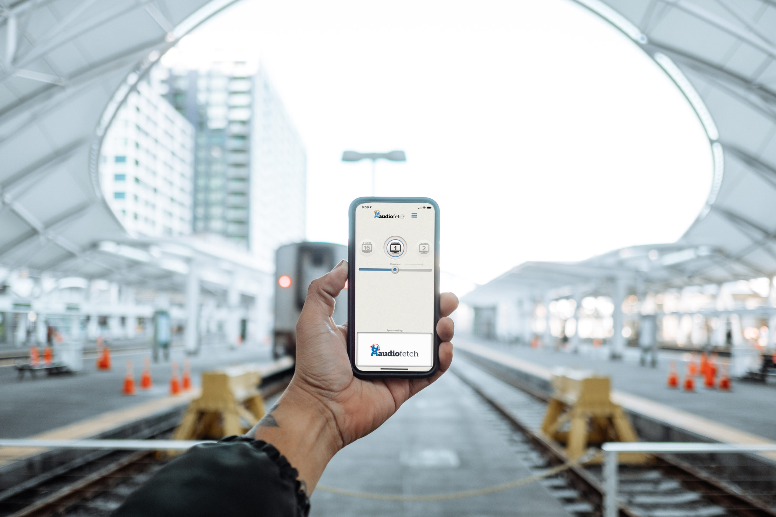 AudioFetch App Being Used at Train Station